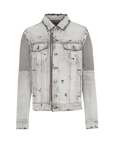 Faded and ripped jean jacket with ridged panels
